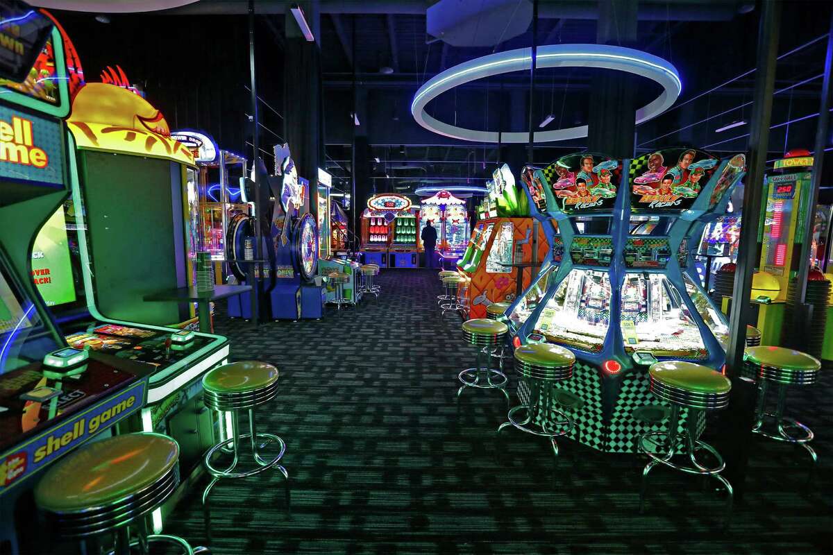 View of the gaming area inside Dave & Busters. The Shops at RiverCenter is in its final days of construction in lieu of opening next week. Construction workers as well as some store and restaurant employees were completing work and training on Friday, Jan. 15, 2016. The shops occupy the portion of real estate that was once occupied by the historic Joske's department store. (Kin Man Hui/San Antonio Express-News)