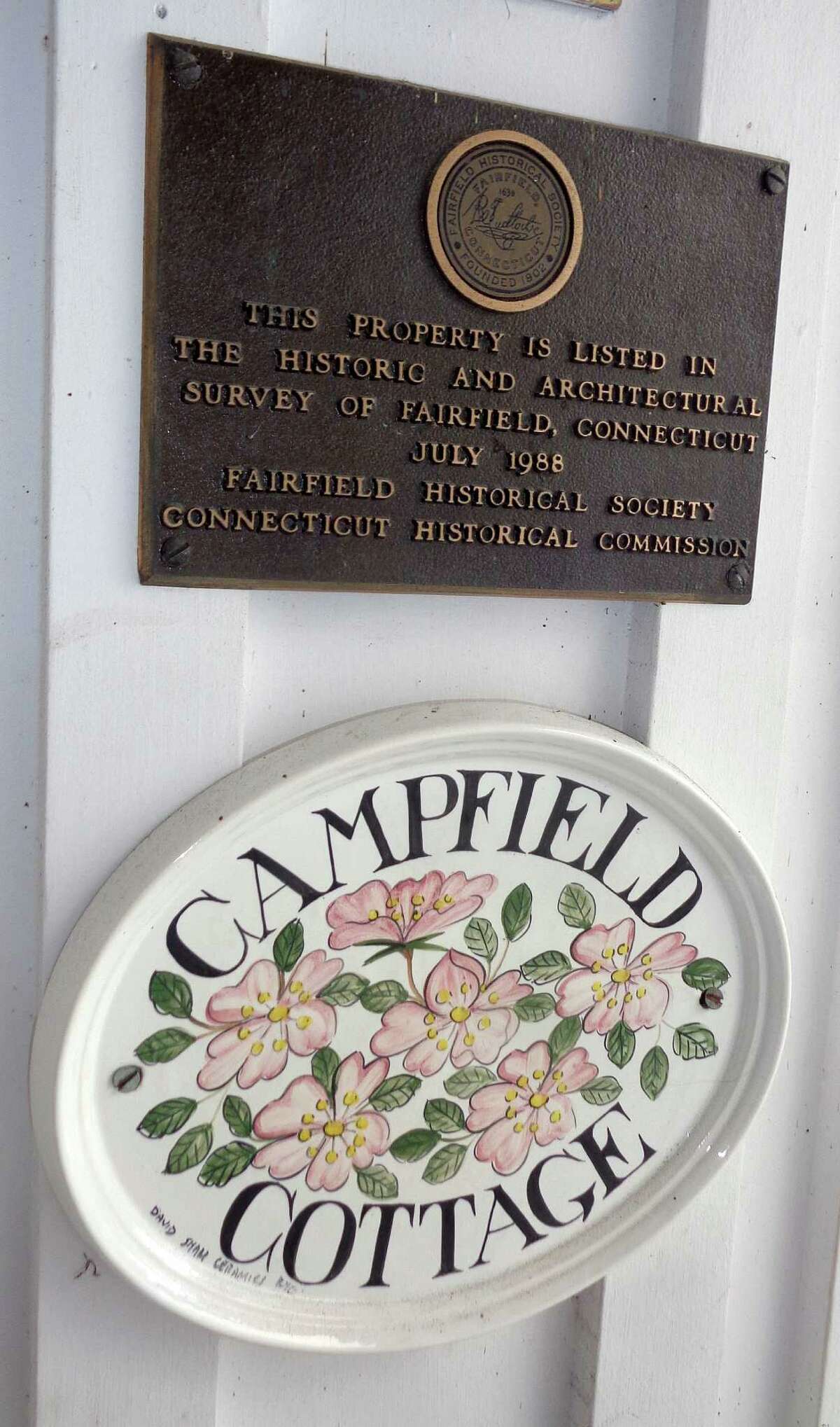 Plaques at the Sunnieholme property note its legacy as one-time part of the Annie B. Jennings estate.