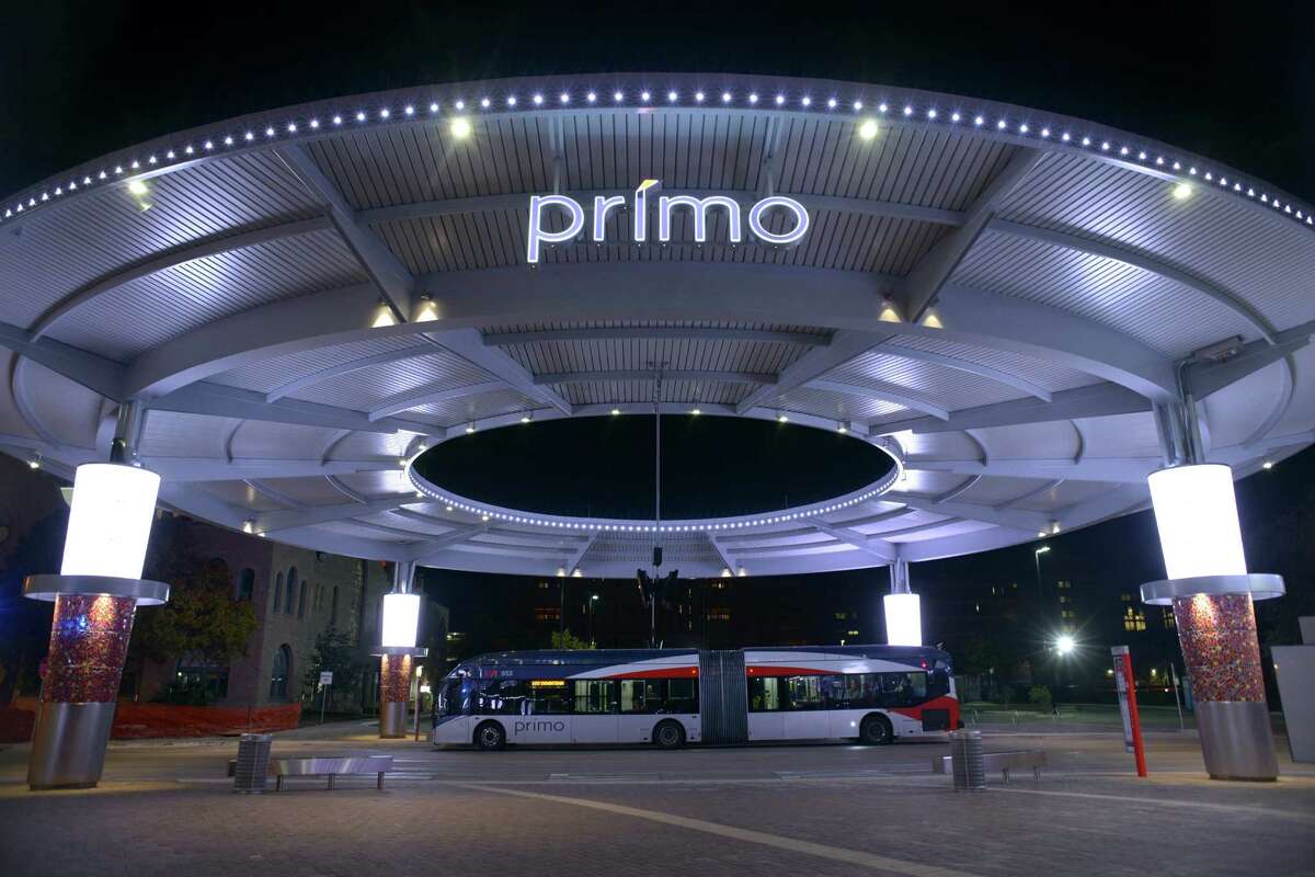 A VIA Primo bus arrives beneath the Primo awning at VIA’s Centro Plaza, at West Houston Street and Frio Street, in early December. With the route changes that started Monday, nine more VIA lines go through Centro, its West Side hub.