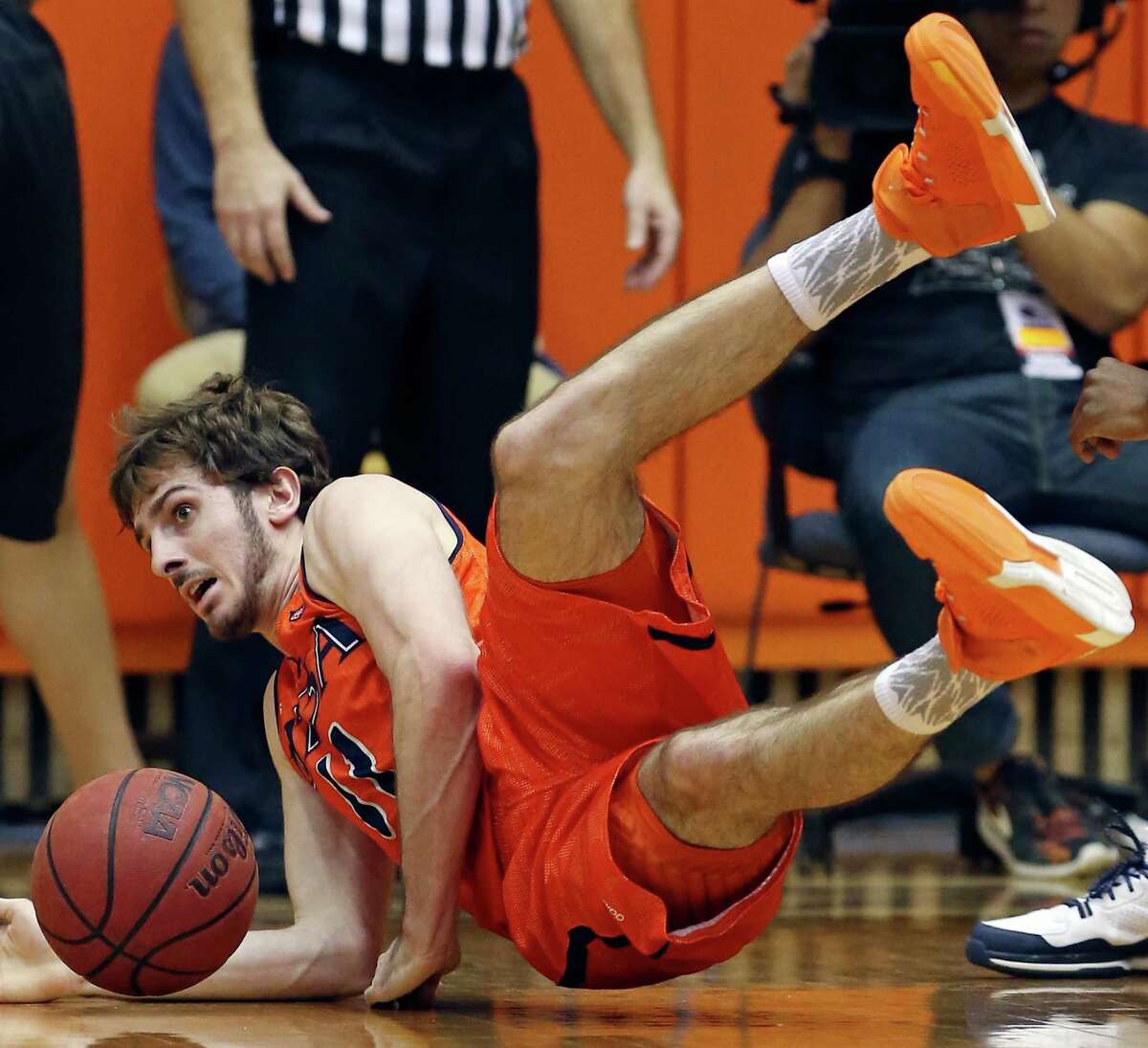UTSA's Austin Karrer dives for a loose ball during second half action against UTEP Saturday Jan. 16, 2016 at the Convocation Center. UTSA won 71-67.