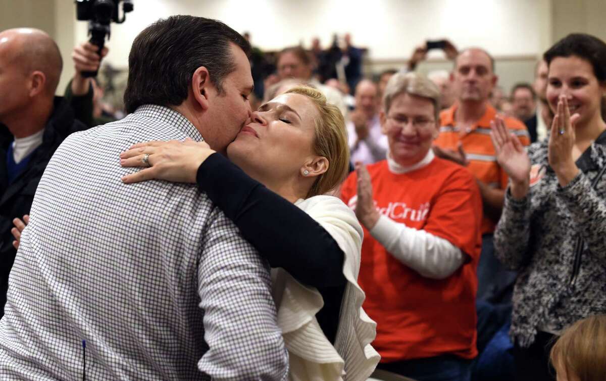 Republican presidential candidate Ted Cruz hugs his wife Heid before he speaking to a town hall meeting sponsored by the Conservative Leadership Project at the USC Alumni Center in Columbia, SC South Carolina January 15, 2016. / AFP / TIMOTHY A. CLARYTIMOTHY A. CLARY/AFP/Getty Images