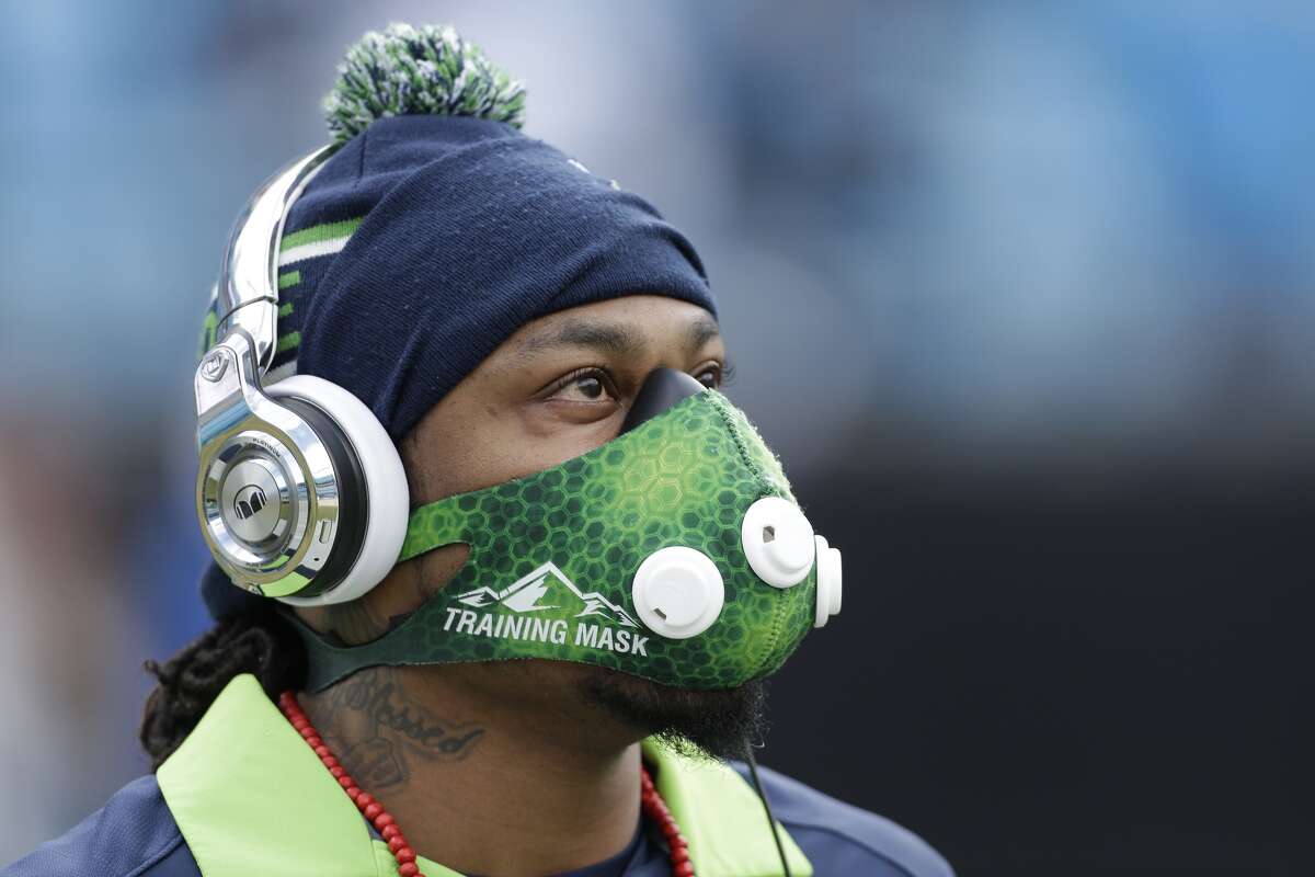 Seattle Seahawks running back Marshawn Lynch warms up before the first half of an NFL divisional playoff football game between the Carolina Panthers and the Seattle Seahawks, Sunday, Jan. 17, 2016, in Charlotte, N.C. (AP Photo/Bob Leverone)