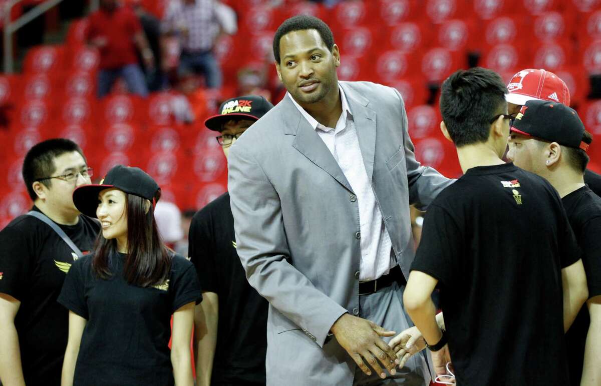 Former Houston Rockets player Robert Horry greets fans before Game 4 of the NBA Western Conference finals against the Golden State Warriors at Toyota Center onMay 25, 2015, in Houston.