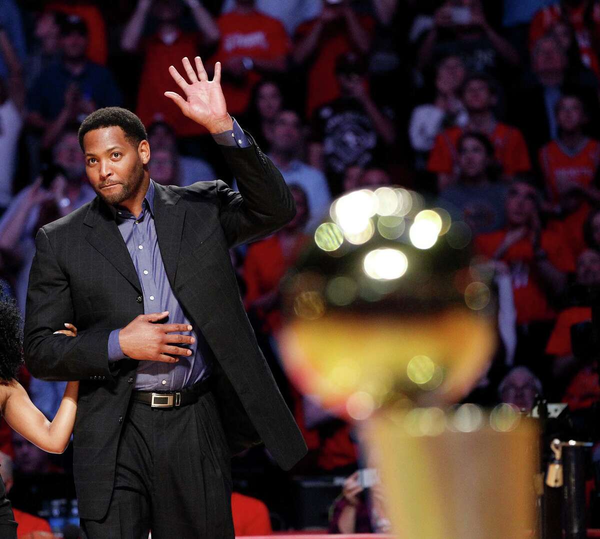 Former Houston Rockets Robert Horry was escorted to center court during the 20th Anniversary of the 1995 Houston Rockets championship during a halftime ceremony of an NBA game at Toyota Center on March 19, 2015, in Houston.