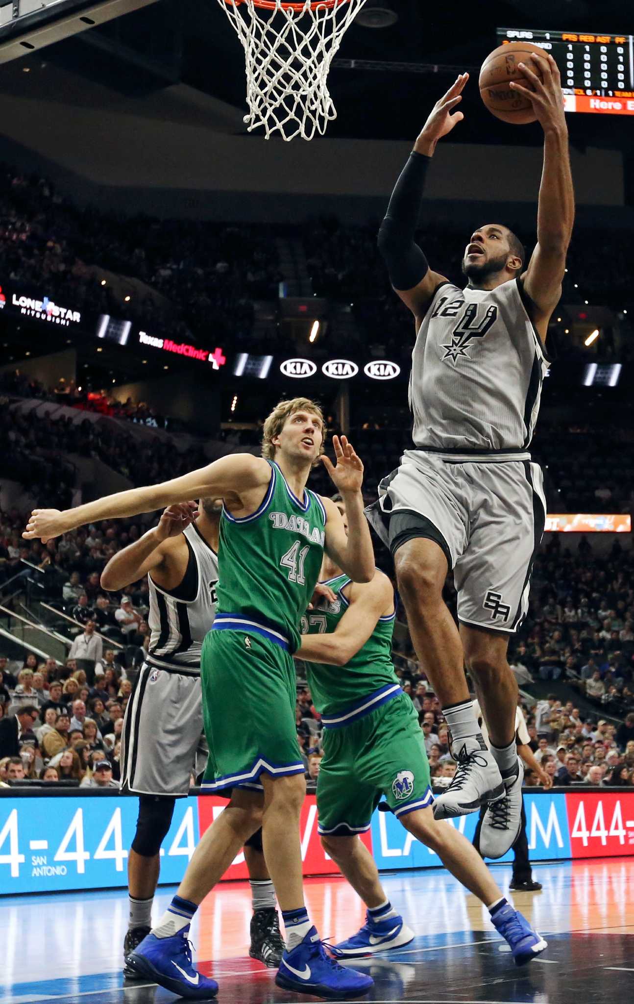 Boban Marjanovic throws down a flat-footed dunk