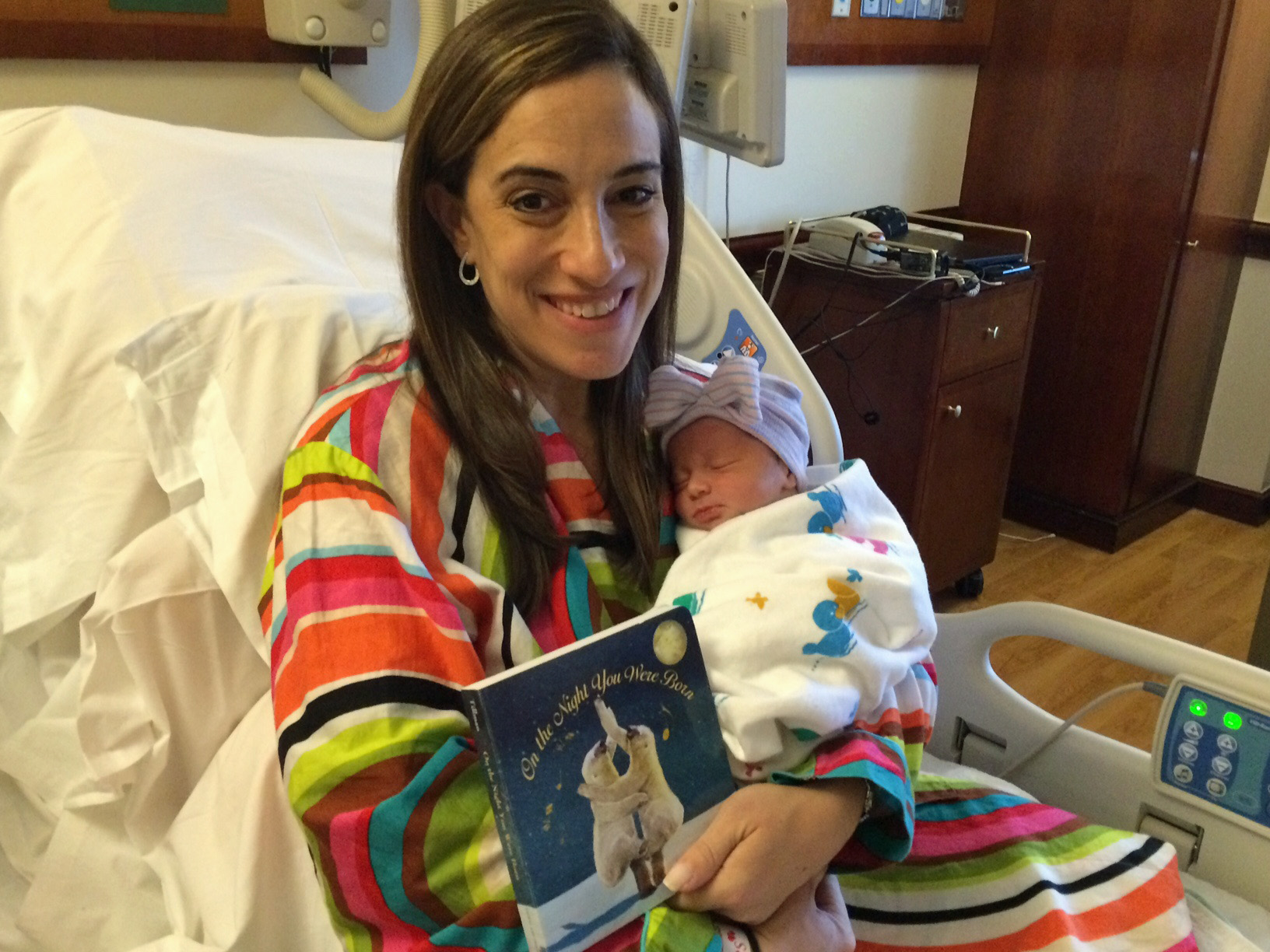 Hospital delivers new book to each new baby