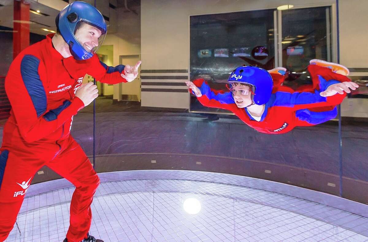 At iFly Indoor Skydiving, an instructor accompanies every flyer into the flight chamber to help them fly right and stay safe during your minute long flight