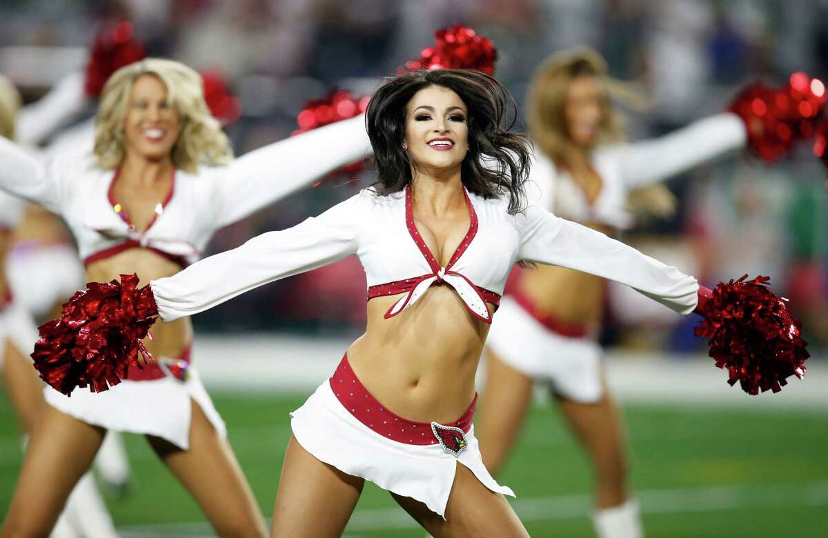 The Arizona Cardinals cheerleaders perform during the first half of an NFL divisional playoff football game against the Green Bay Packers, Saturday, Jan. 16, 2016, in Glendale, Ariz. (AP Photo/Rick Scuteri)