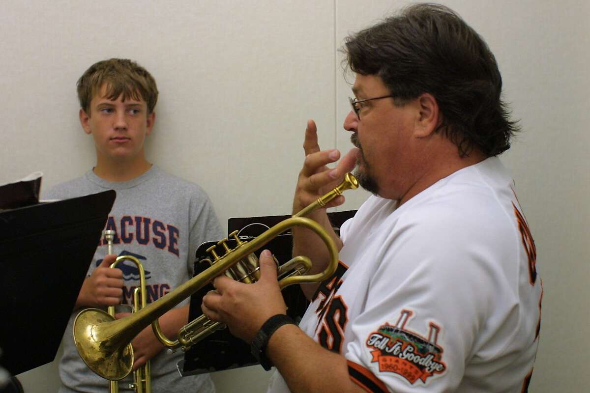 Tower of Power's Mic Gillette rehearses with a student.