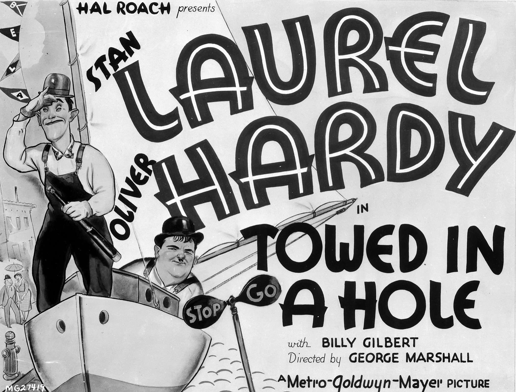 A poster advertising the Laurel and Hardy short, 'Towed In A Hole', directed by George Marshall, 1932.