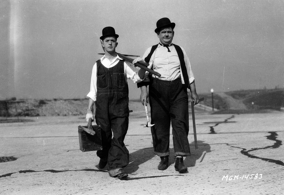 Stan Laurel and Oliver Hardy in a publicity still for 'The Finishing Touch' directed by Leo McCarey and Clyde Bruckman.