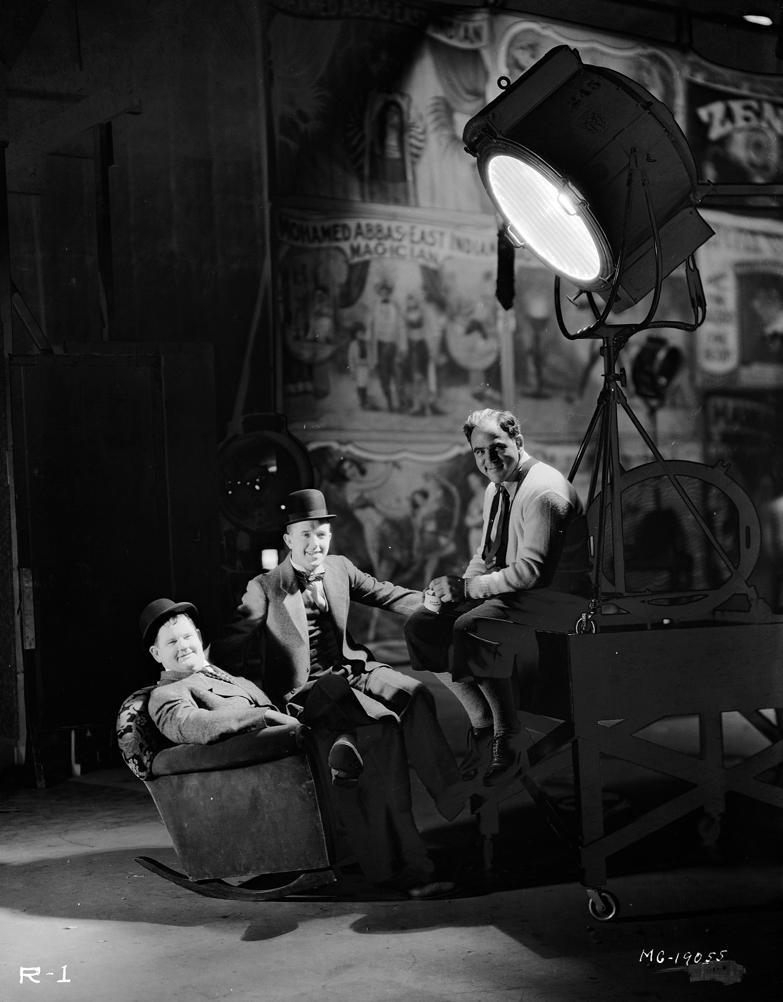 Stan Laurel and Oliver Hardy with their long term producer, Hal Roach, 1930.