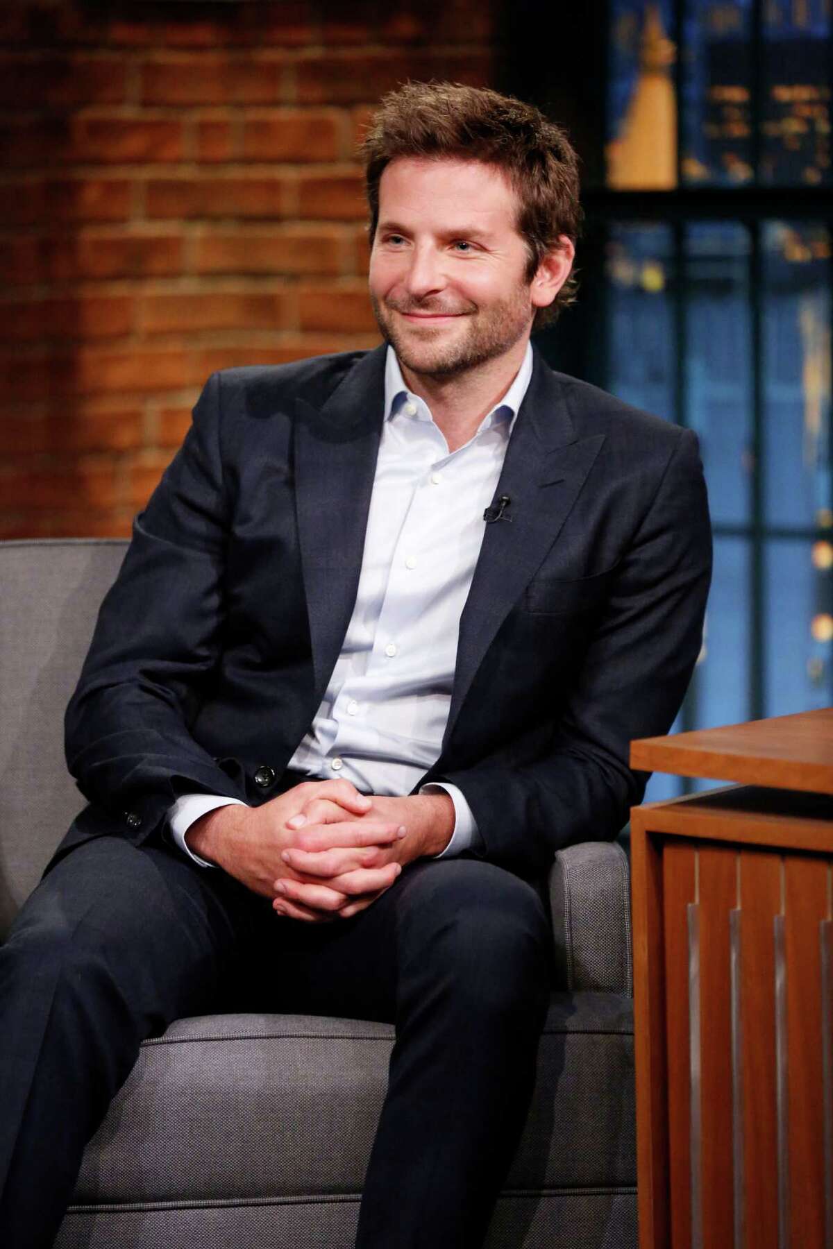 Bradley Cooper How Kim K. is connected: After her split from Reggie Bush, Kim had a rumored hook-up in 2010 with soccer star Cristiano Ronaldo, who is model Irina Shayk's ex-boyfriend. Shayk is Cooper's current girlfriend.