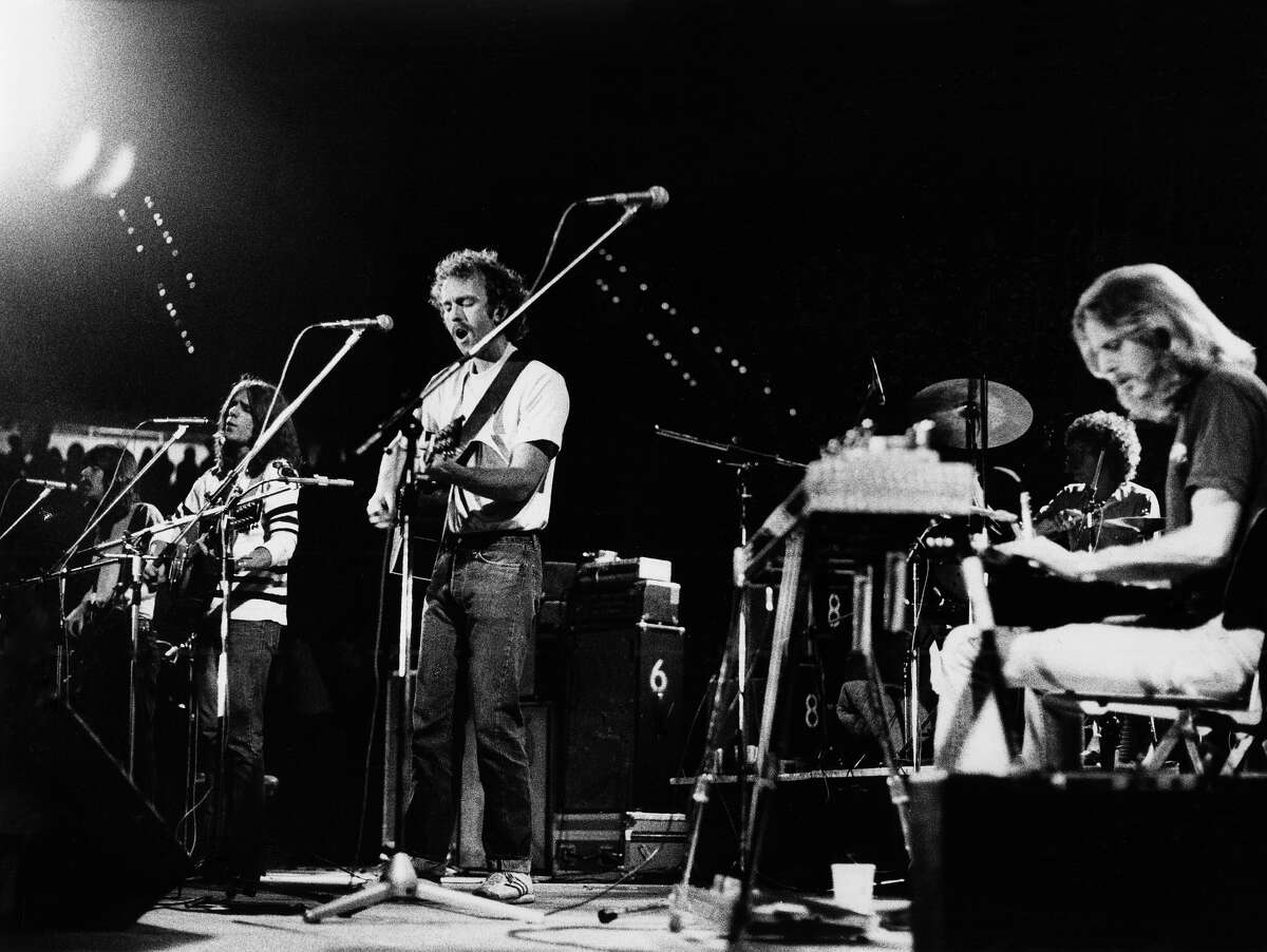 Randy Meisner, Glenn Frey, Bernie Leadon and Don Felder of The Eagles perform on stage in 1974.