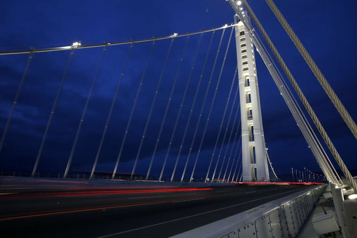 Gunmen fired shots into a party bus near the eastern end of the Bay Bridge early Saturday, March 12, 2016 and injured four people, the California Highway Patrol said. File photo of the Bay Bridge.