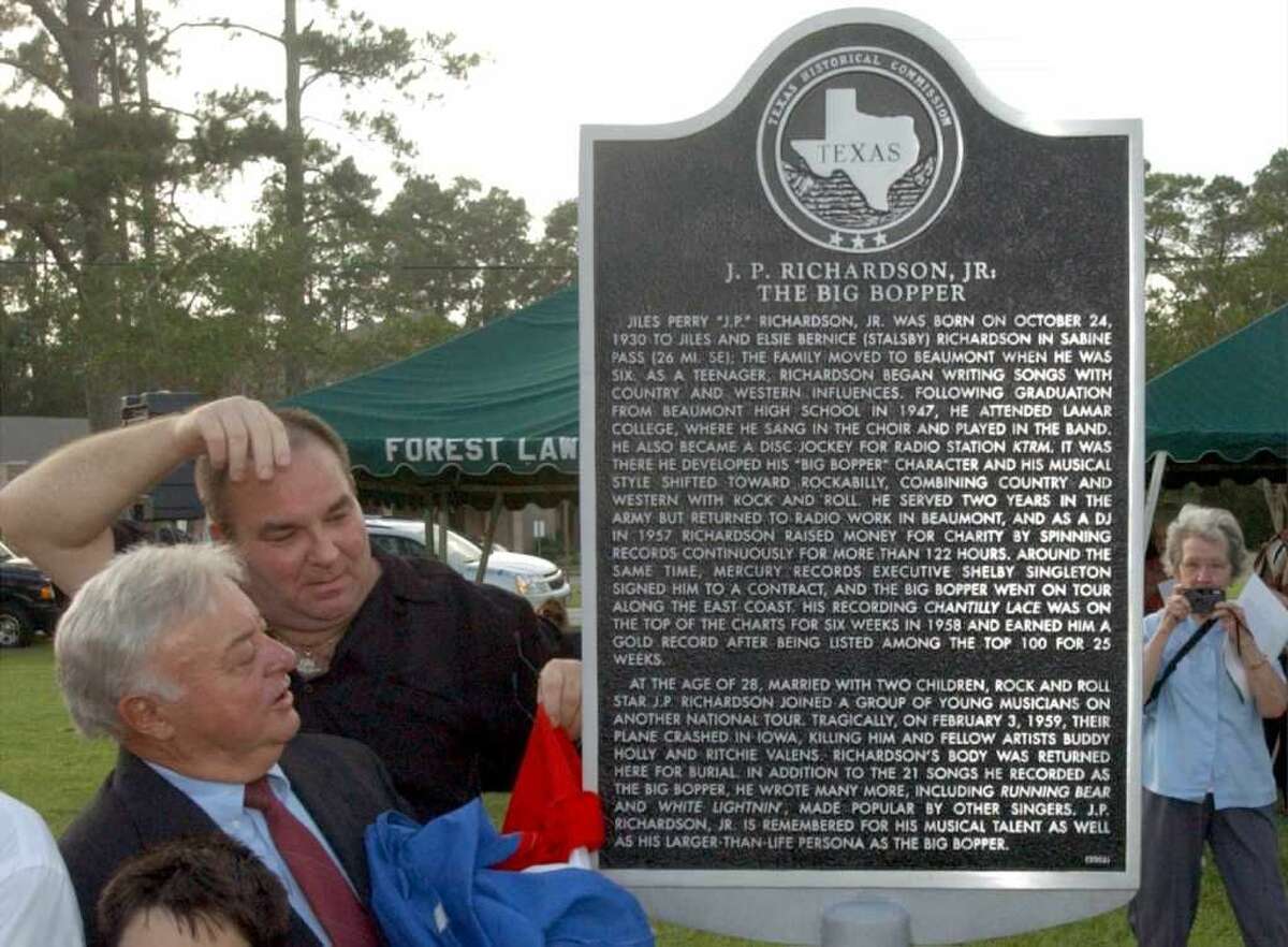 Johnny Preston, front, and Jay Richardson, son of J.P. "The Big Bopper" Richardson Jr, unveil a state historical marker memorializing the Big Bopper's life Friday September 22, 2006 at Forest Lawn Memorial Park in Beaumont, where The Big Bopper is buried.