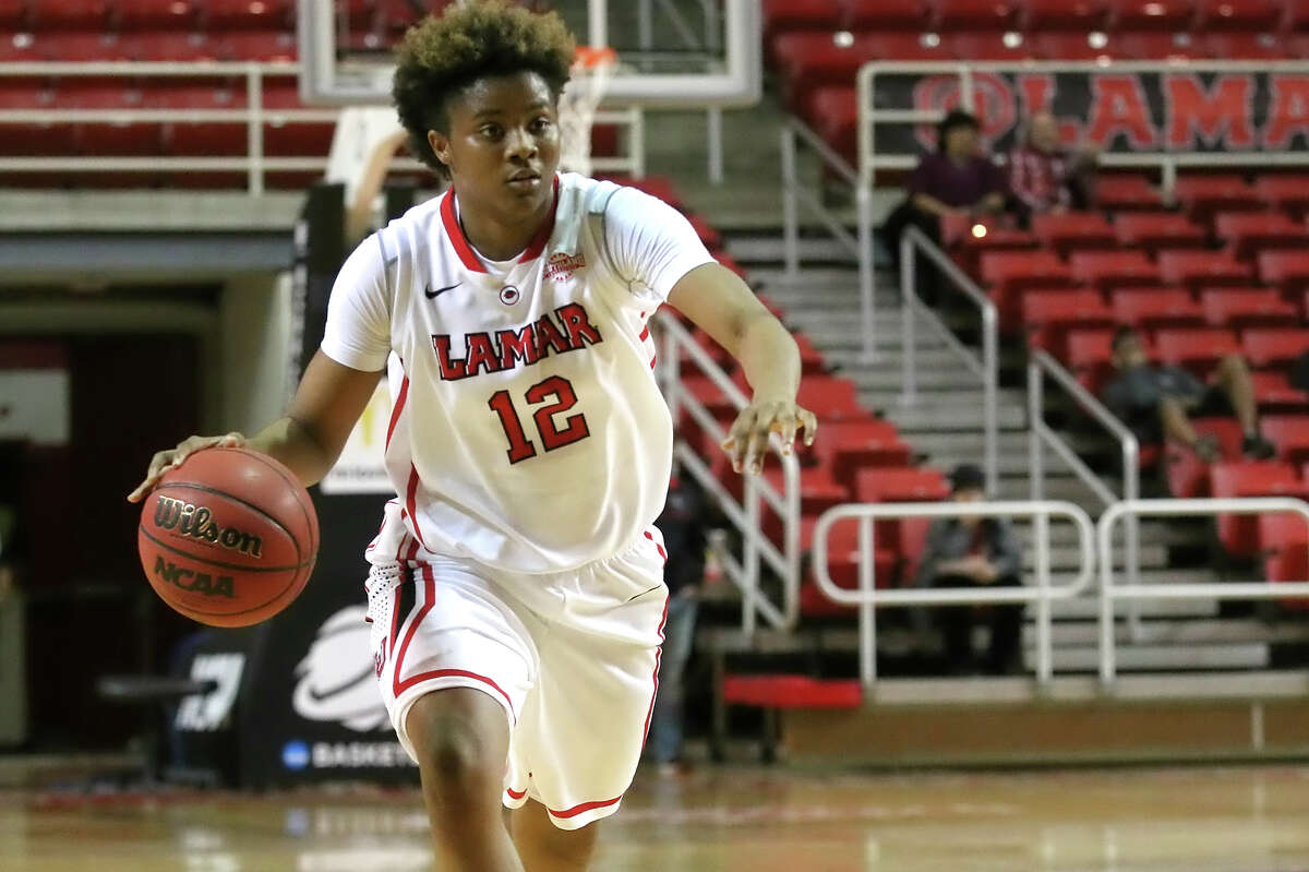 Kiara Desamours looks to drive to the basket during the game between the Lamar Cardinals and Texas A&M University-Kingsville Javelinas at the Montagne Center Thursday, December 17th, 2015 - photo provided by Kyle Ezell