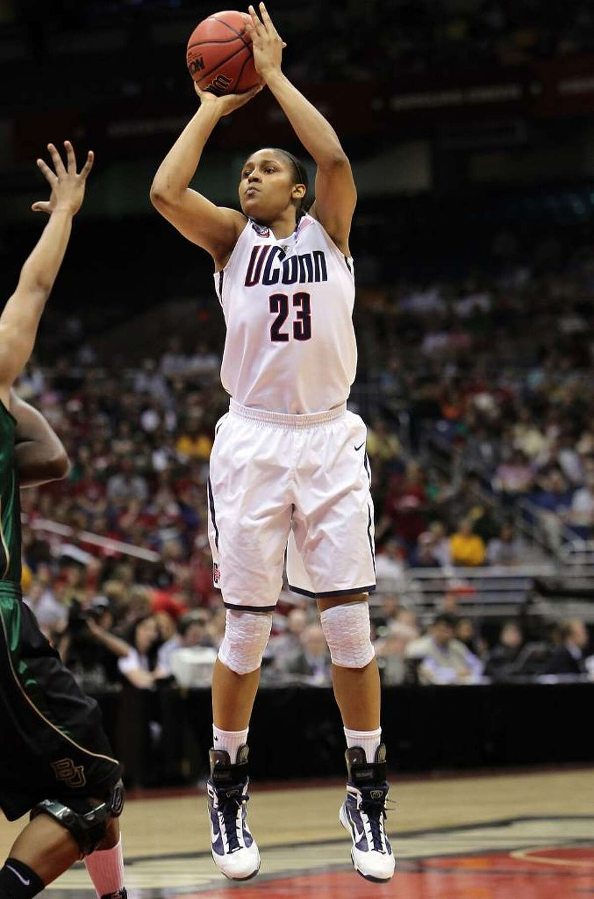SAN ANTONIO - APRIL 04: Forward Maya Moore #23 of the Connecticut Huskies takes a shot against the Baylor Bears during the Women's Final Four Semifinals at the Alamodome on April 4, 2010 in San Antonio, Texas. (Photo by Ronald Martinez/Getty Images) *** Local Caption *** Maya Moore