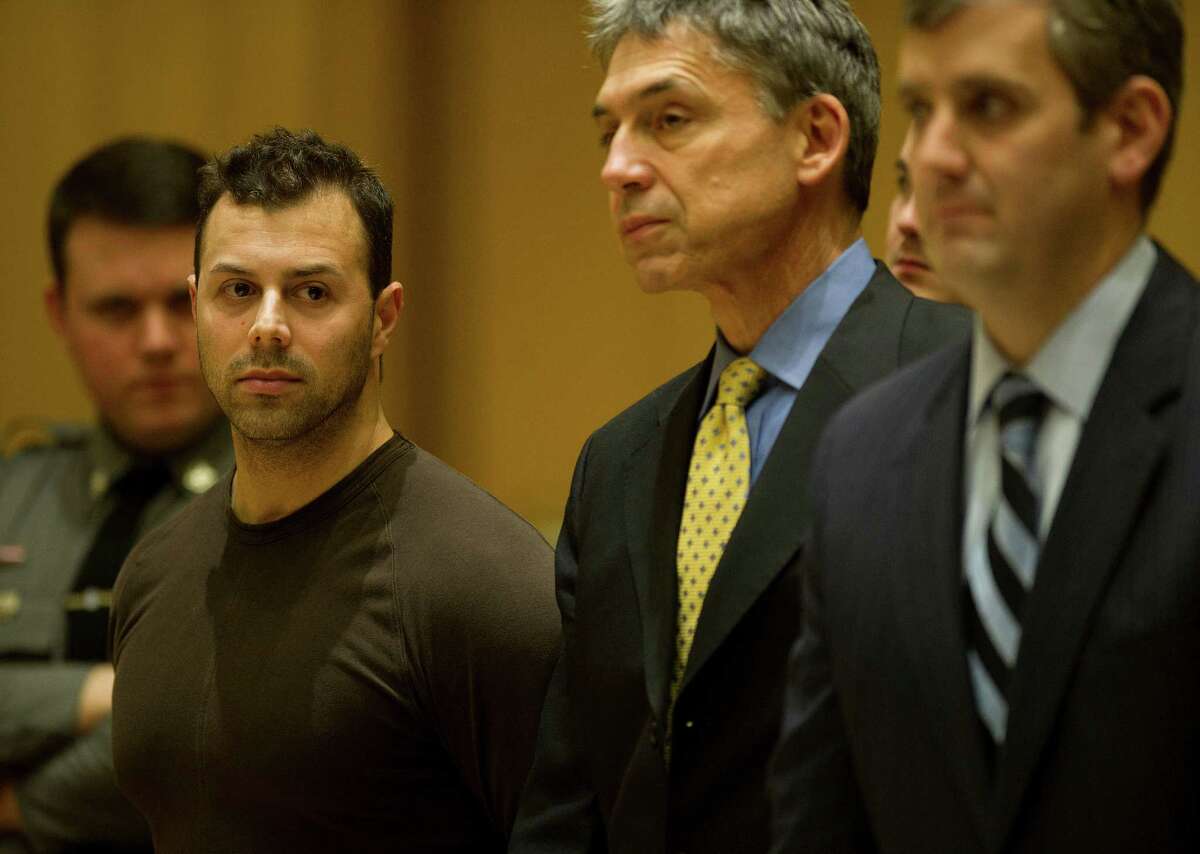 Anthony Manousos, 33, appears in State Superior Court with his attorneys, Frank DiScala, center and Mike Skiber, right, in Stamford, Conn. File photo.