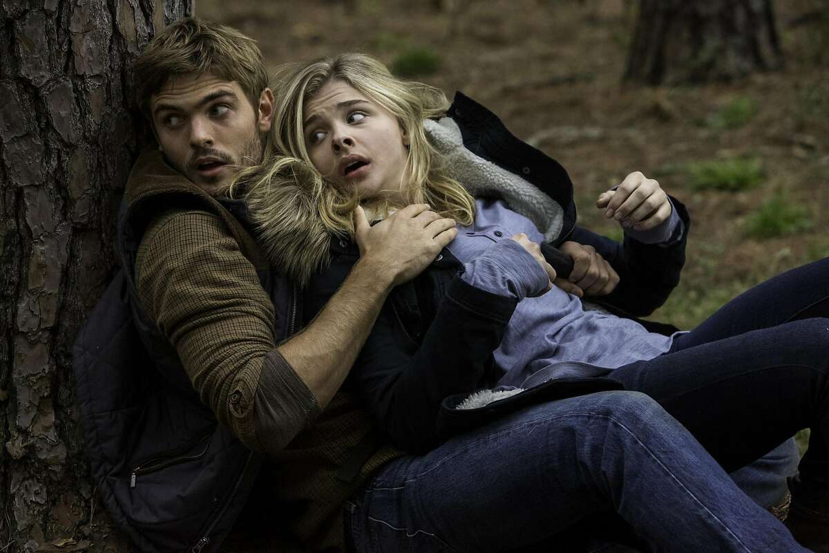 Alex Roe, left, and Chloe Grace Moretz in Columbia Pictures' "The 5th Wave." (Chuck Zlotnick/Sony Pictures/TNS)