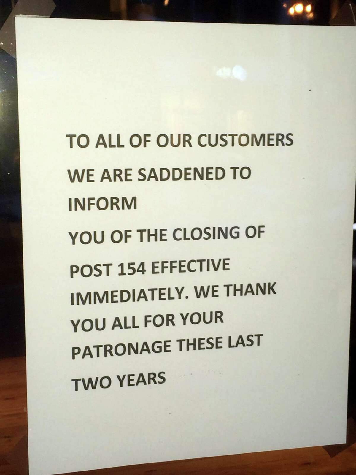 This sign announcing the closing of Post 154 restautant, which opened in August 2013 in the former U.S. Post Office downtown, was posted on its door this week.