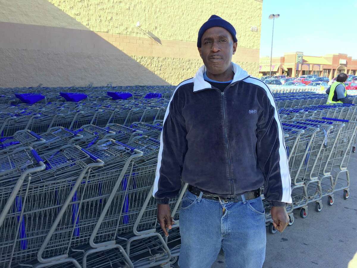 Thomas Smith, 52, of Albany, an ex-convict who was formerly homeless, was fired from his $9-an-hour job gathering shopping carts at the Wal-Mart Supercenter in East Greenbush after he redeemed $2 worth of empty cans and bottles discarded in the parking lot. (Paul Grondahl / Times Union)