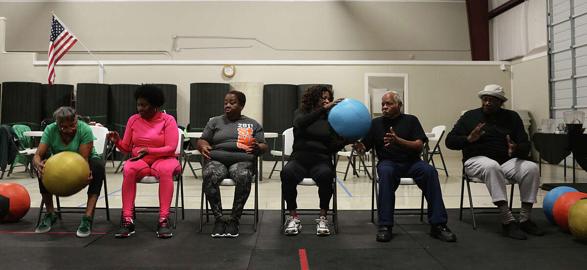 Senior citizens participate in a crossfit program at The Get Up Community Center, Thursday, Jan. 7, 2016,