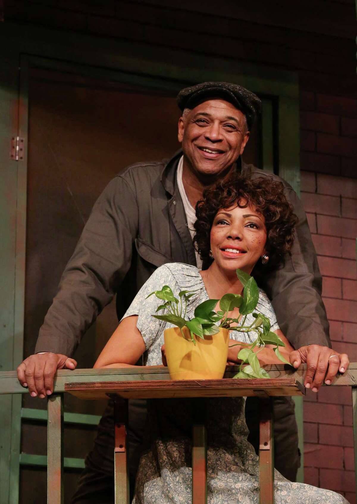 Alex Morris, Sr., left, performs as Troy Maxson, with Detria Ward, performing as Rose Maxson, during a scene from "Fences" at Ensemble Theatre Wednesday, Jan. 20, 2016, in Houston. ( Jon Shapley / Houston Chronicle )