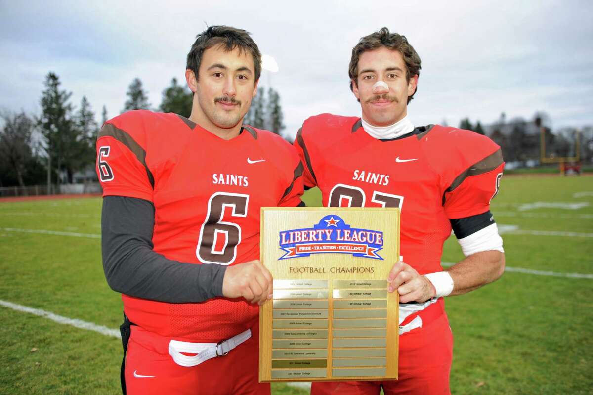 Mike Lefflbine, left, and Vincent Ferraro, both of whom graduated from Greenwich High School, helped lead the St. Lawrence football team to the Liberty League championship in 2015.