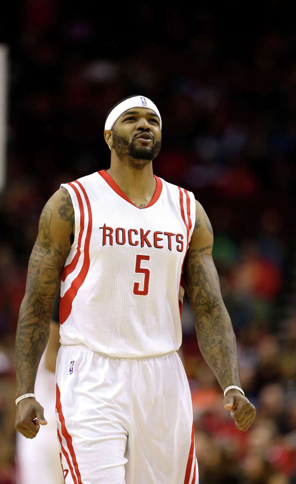 Houston Rockets' Josh Smith (5) walks down the court after missing a shot against the Milwaukee Bucks during the first half of an NBA basketball game Friday, Jan. 22, 2016, in Houston. (AP Photo/David J. Phillip)
