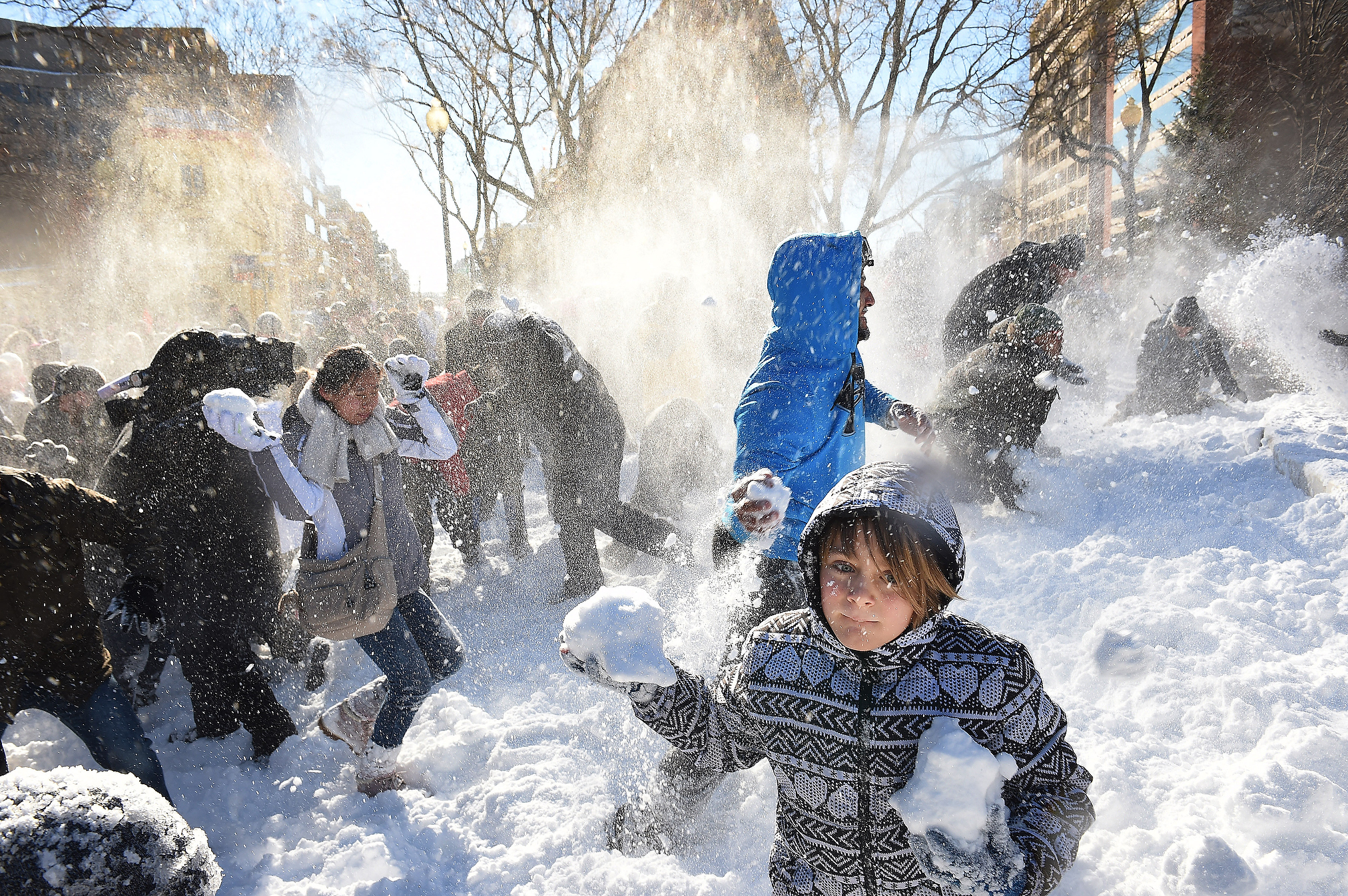 Gallery Photos of "Child In Snowball Fight In Winter Snow" .