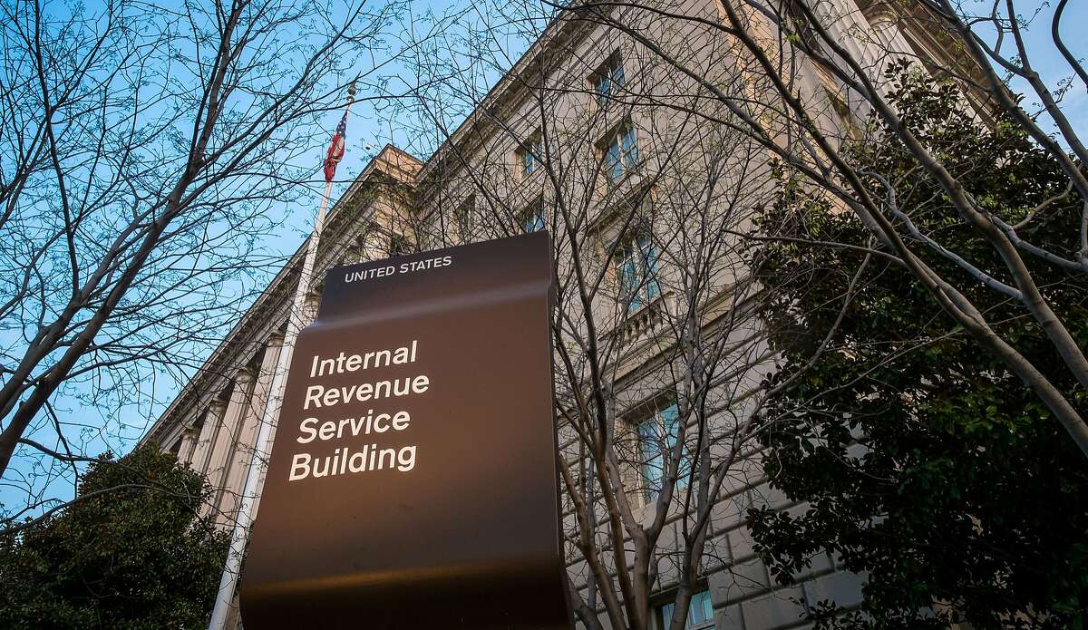 FILE - This April 13, 2014, file photo, shows The Internal Revenue Service (IRS) headquarters building Washington. Although many small business owners hire accountants and attorneys to complete their income tax returns, taxes are a hassle. In a survey released in 2015 by the advocacy group National Small Business Association, nearly 60 percent of the owners surveyed said the administrative burdens were the biggest problems posed by federal taxes. And 85 percent of the more than 675 owners said they relied on a professional to prepare their returns. (AP Photo/J. David Ake, File)