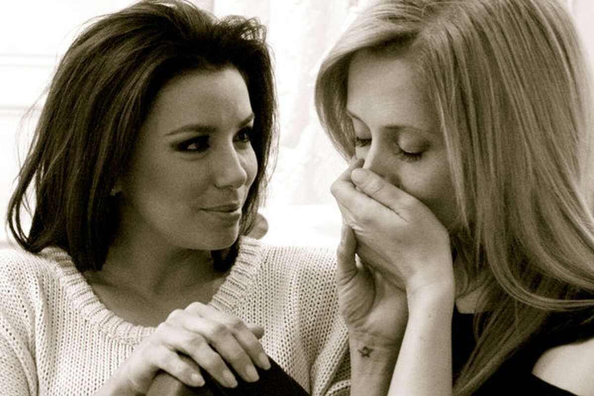 Eva Longoria posed with singer Lara Fabian in this seductive photo as part of a photo series aimed at showing that "love is love," regardless of sexual orientation.
