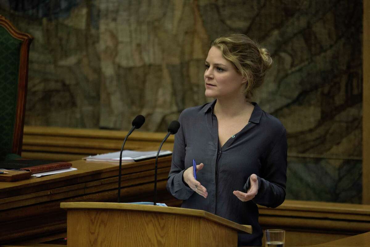 Johanne Schmidt-Nielsen from The Red-Green Alliance speaks in Parliament, in Copenhagen on Tuesday Jan. 26, 2016. Denmark's Parliament is expected to vote allow police seizing valuables worth more than $1,500 from asylum-seekers to help cover their housing and food costs while their cases were being processed. (Peter Hove Olesen/ POLFOTO via AP) DENMARK OUT
