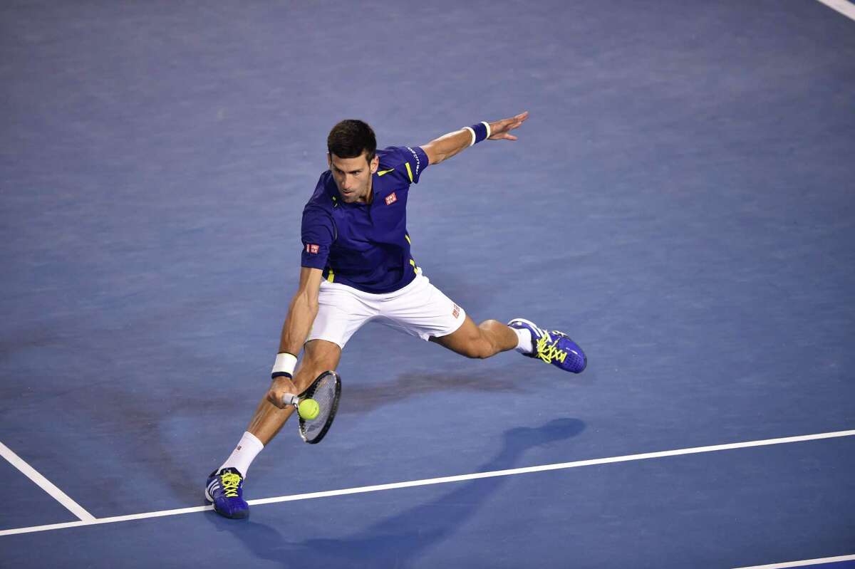 Novak Djokovic was sharp in beating Kei Nishikori and setting up a semifinal showdown with Roger Federer.