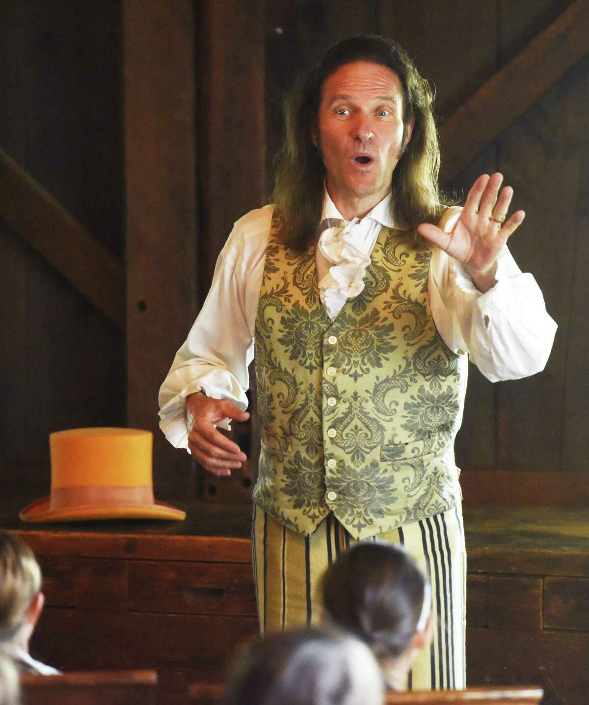 Historical storyteller Jonathan Kruk gives a performance during the Greenwich Historical Society History and Art Camp at the Bush-Holley House in Greenwich, Conn. Sunday, June 7, 2015.