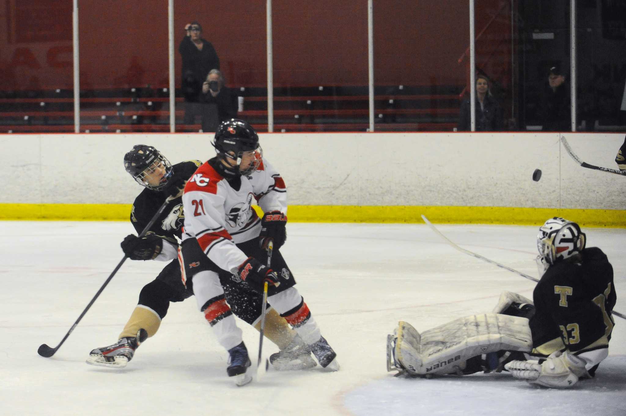 New Canaan hockey topples Trumbull