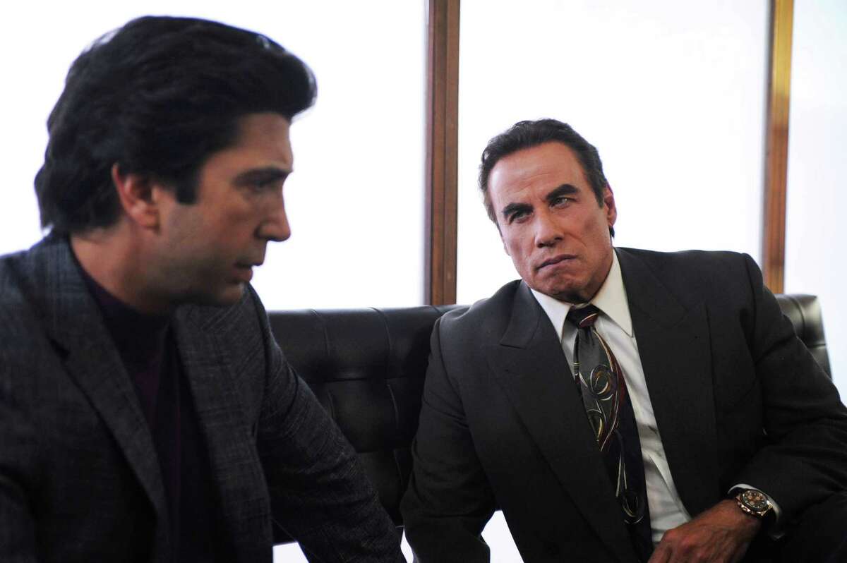 David Schwimmer portrays Robert Kardashian and John Travolta plays Robert Shapiro in 'American Crime Story; The People v. O.J. Simpson,' on FX. January, 2016 THE PEOPLE v. O.J. SIMPSON: AMERICAN CRIME STORY "From the Ashes of Tragedy" Episode 101 (Airs Tuesday, February 2, 10:00 pm/ep) -- - Pictured: (l-r) David Schwimmer as Robert Kardashian, John Travolta as Robert Shapiro. CR: Ray Mickshaw/FX