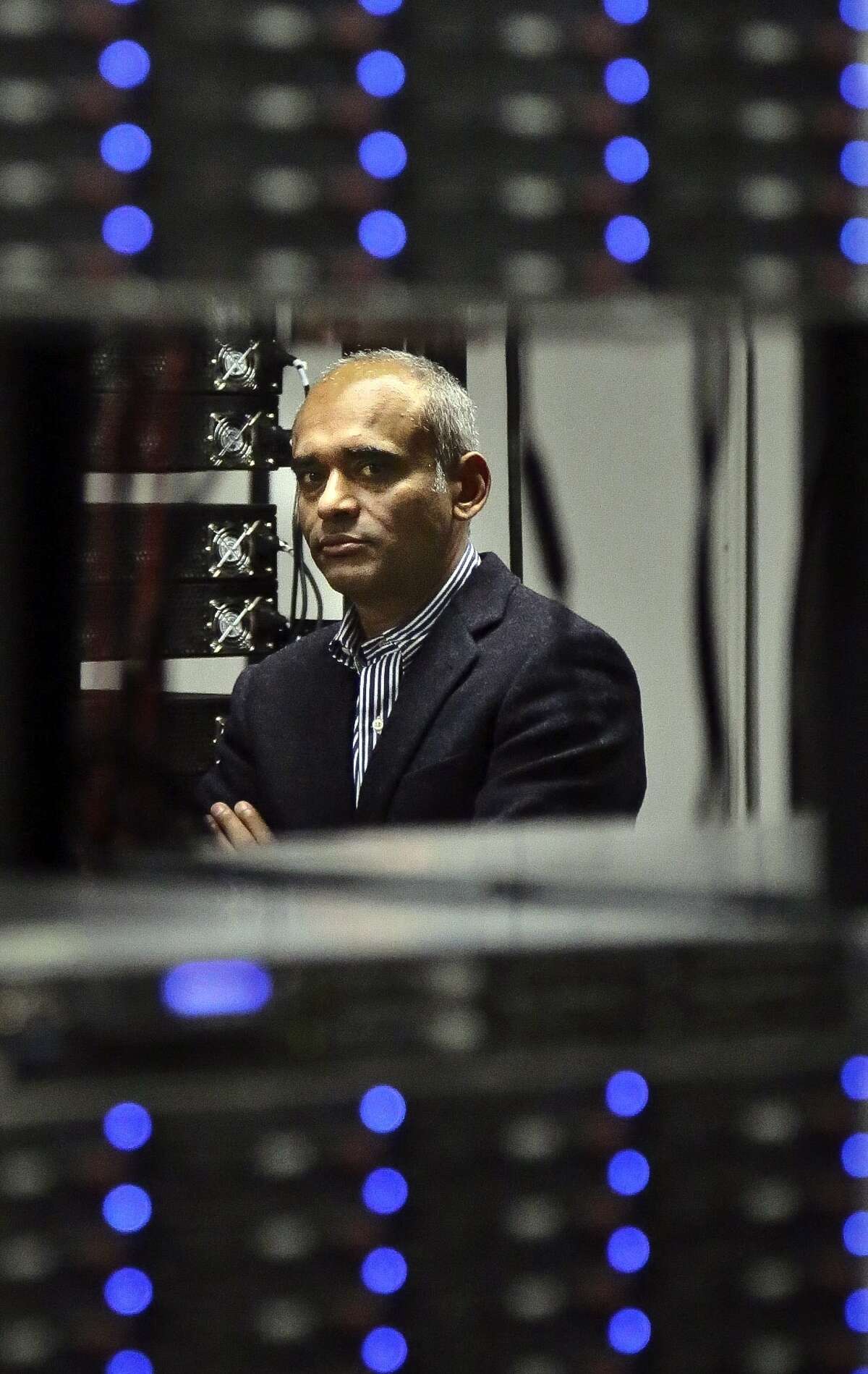 FILE - In this Thursday, Dec. 20, 2012, file photo, Chet Kanojia, founder and CEO of Aereo, Inc., li