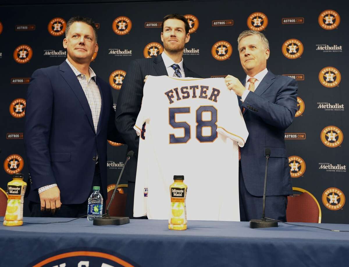 Astros Manager A.J. Hinch (l-r), free agent right-hand pitcher Doug Fister and General Manager Jeff Luhnow Thursday, Jan. 28, 2016, in Houston. ( Steve Gonzales / Houston Chronicle )