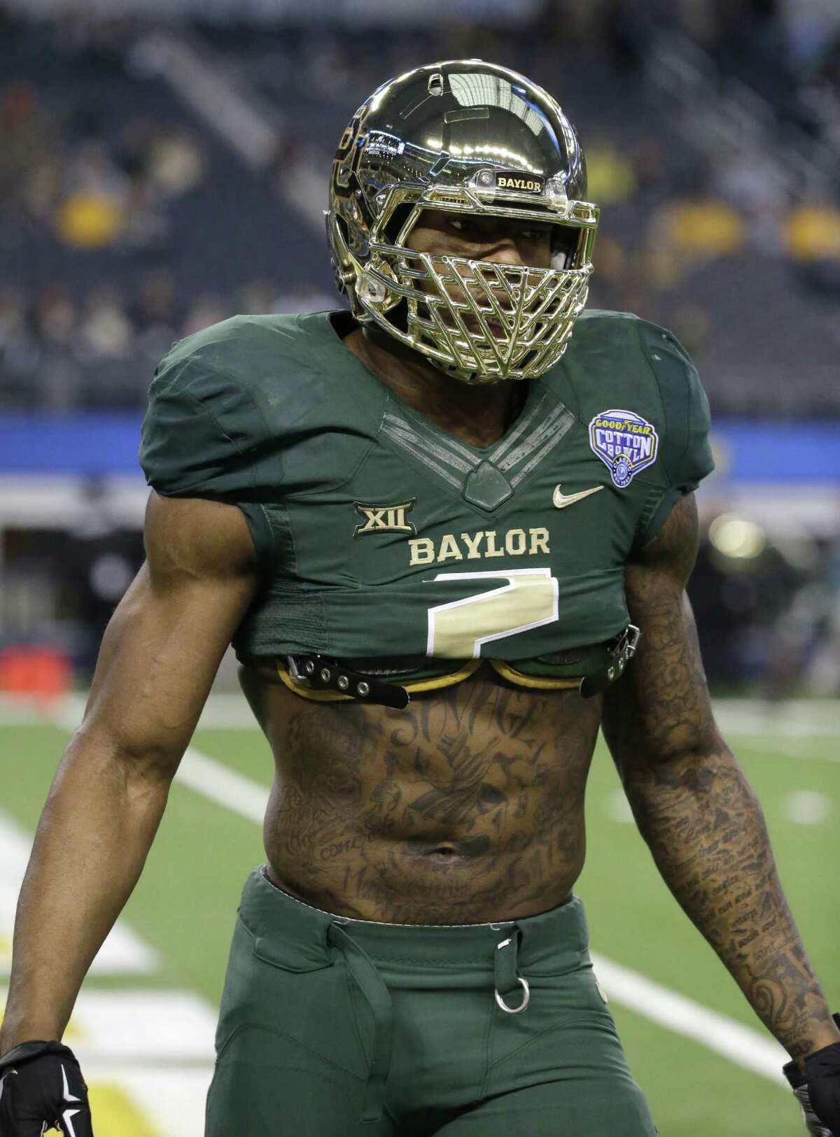 Baylor defensive end Shawn Oakman (2) warms up before the Cotton Bowl NCAA college football game Thursday, Jan. 1, 2015, in Arlington, Texas. (AP Photo/LM Otero)