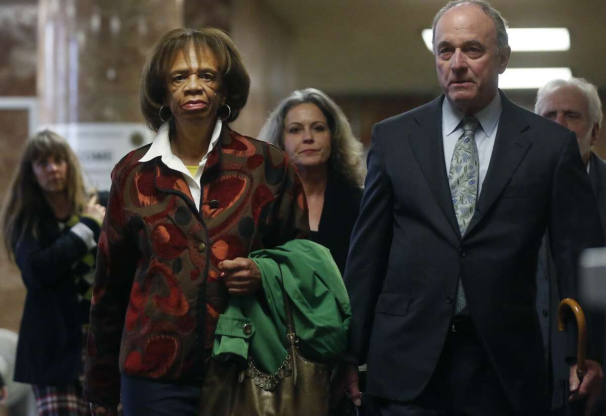 Zula Jones, left, walks to a court room with her attorney John Keker Jan. 29, 2016 for an appearance in Superior Court for charges of accepting bribes for political favors in the Hall of Justice Building in San Francisco, Calif.