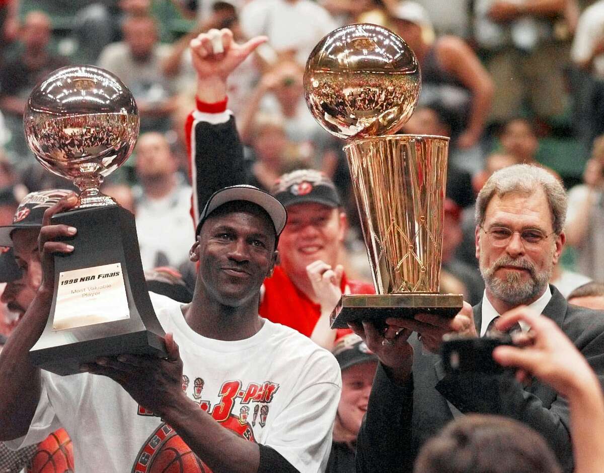 Michael Jordan of the Chicago Bulls celebrates winning the NBA