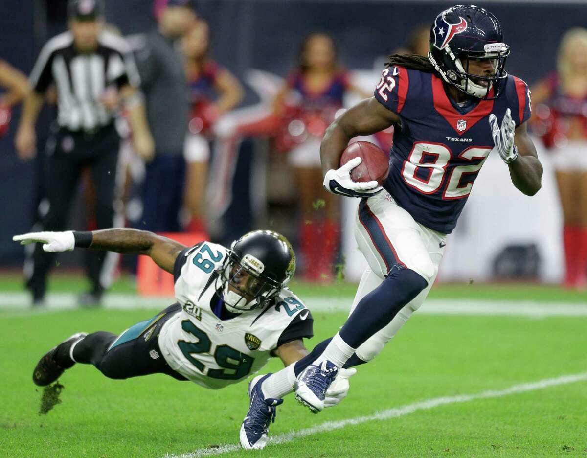 Houston Texans wide receiver Keshawn Martin breaks away from Jacksonville Jaguars defensive back Teddy Williams on a punt return during the third quarterat NRG Stadium on Dec. 28, 2014, in Houston.