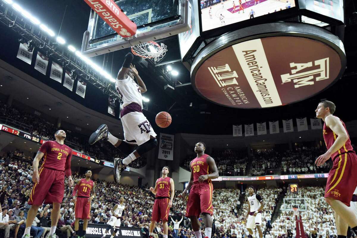 Texas A&M's Danuel House (23) dunks against Iowa State during the first half of an NCAA college basketball game, Saturday, Jan. 30, 2016, in College Station, Texas. (AP Photo/Sam Craft)