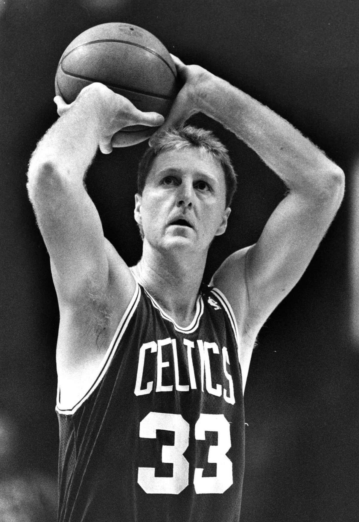 Boston Celtics’ Larry Bird shoots a jumper in 1989.