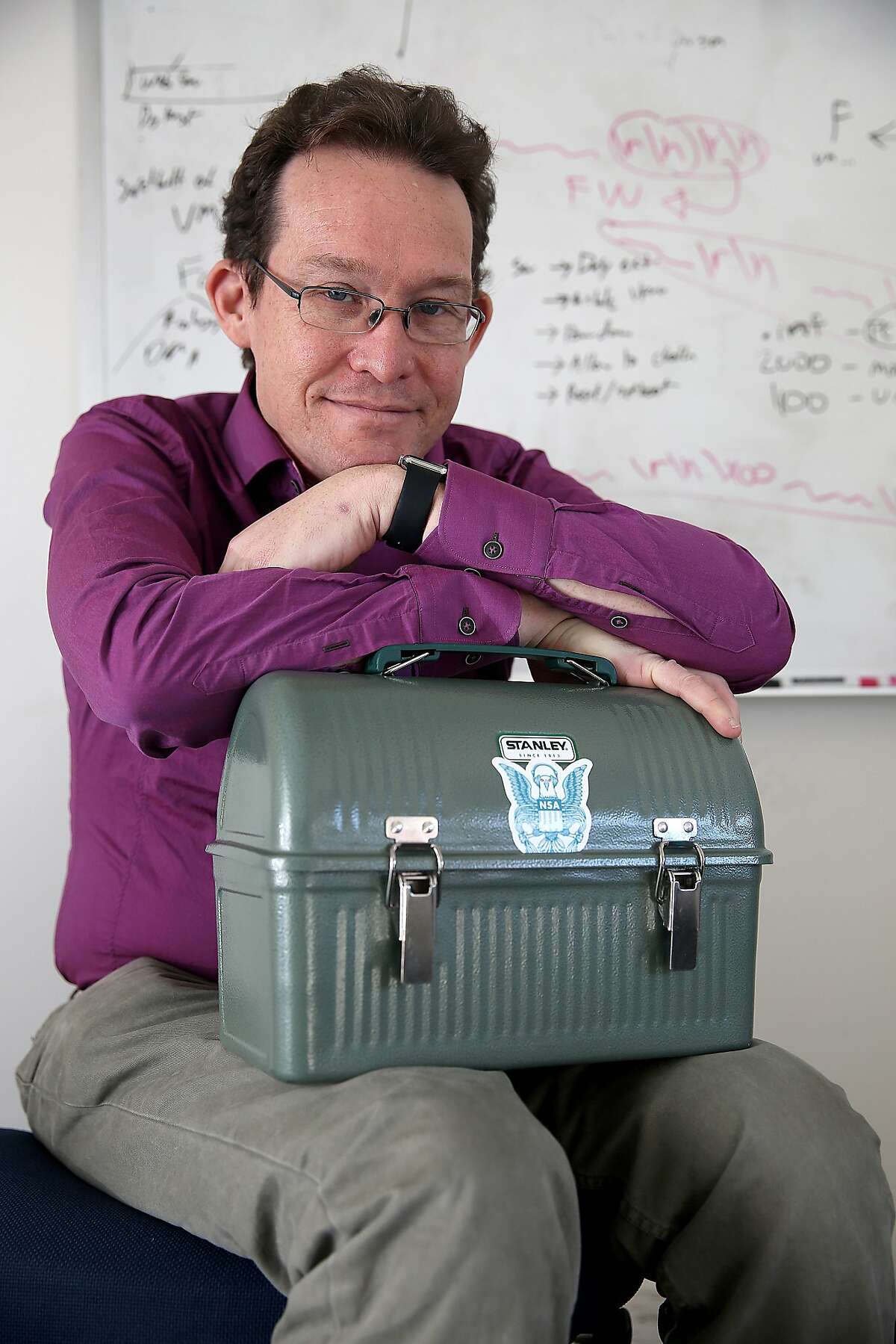 Nicholas Weaver talks about the Intrusion Detection system in his lunchbox that he's built at his office in Berkeley, California, on Monday, February 1, 2016. He assigned about twenty students a computer network assignment to build an NSA style surveillance system.