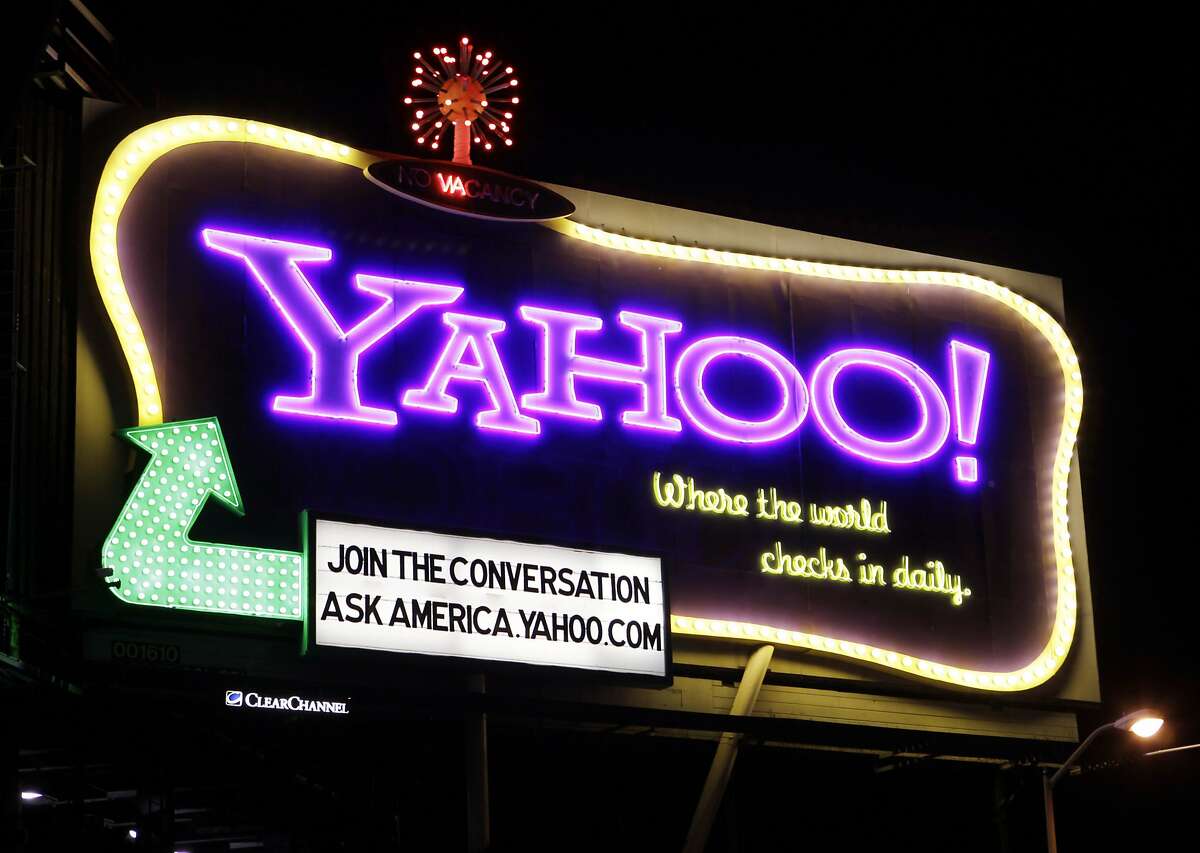 FILE - In this Oct. 4, 2010 file photo, a Yahoo signboard is displayed in San Francisco. Shares of Yahoo are up sharply before the opening bell, Wednesday, Dec. 2, 2015, on a report that the company will discuss the sale of its Internet business. (AP Photo/Paul Sakuma)