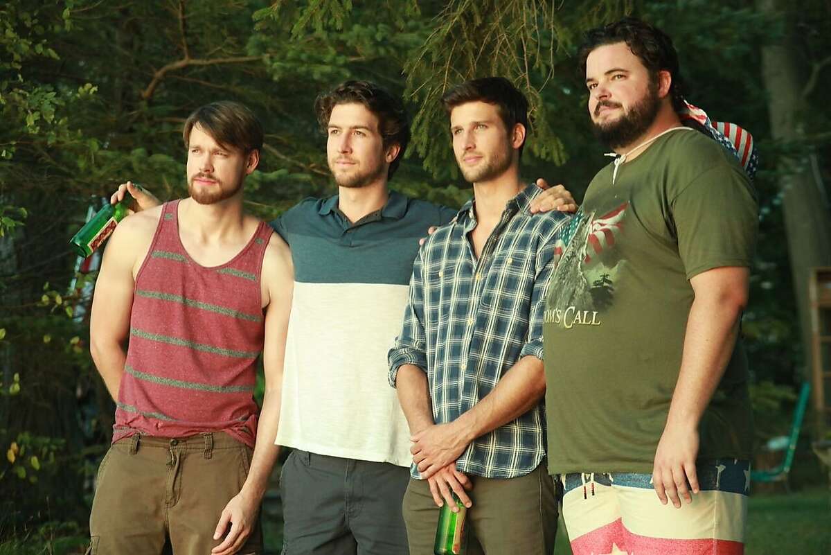 The lives of four blue-collar men Ð from left, Nick (Chord Overstreet), Adam (Evan Todd), Chris (Parker Young) and Ortu (Jon Gabrus) -- change when Adam comes out as gay. Credit: Gravitas Ventures