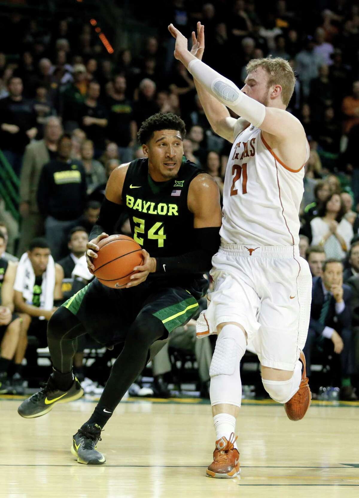 Baylor's Ishmail Wainright (24) works the baseline against Texas's Connor Lammert (21) in the second half of an NCAA college basketball game, Monday, Feb. 1, 2016, in Waco, Texas. Texas won 67-59. (AP Photo/Tony Gutierrez)